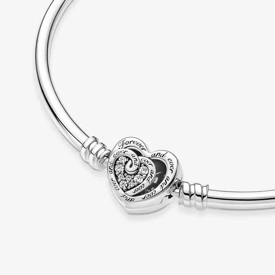 Bracelet Jonc Fermoir Cœurs de l'Infini Entrelacés Pandora Moments 69€ - 591064C01 Bracelet Jonc Fermoir Cœurs de l'Infini Entrelacés Pandora Moments 69€ - 591064C01